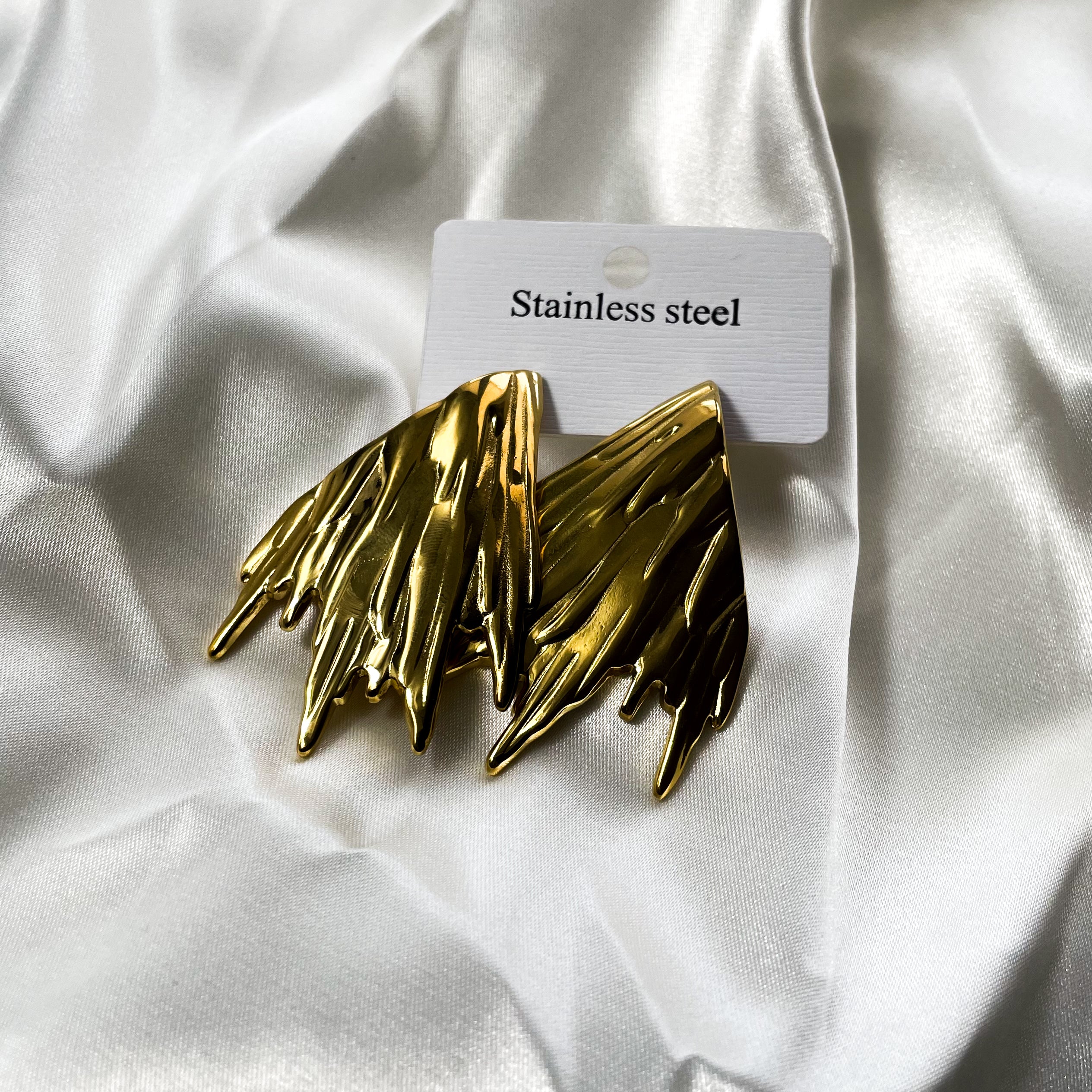 Boucles d'oreilles en métal en forme d'aile